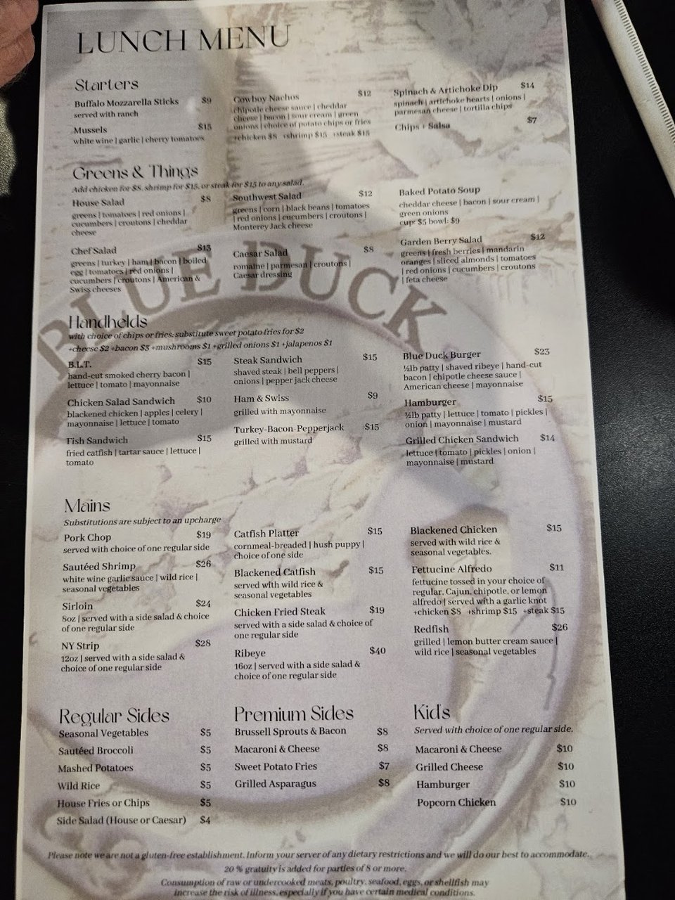 Restaurant menu page with salads, handhelds, and catfish.