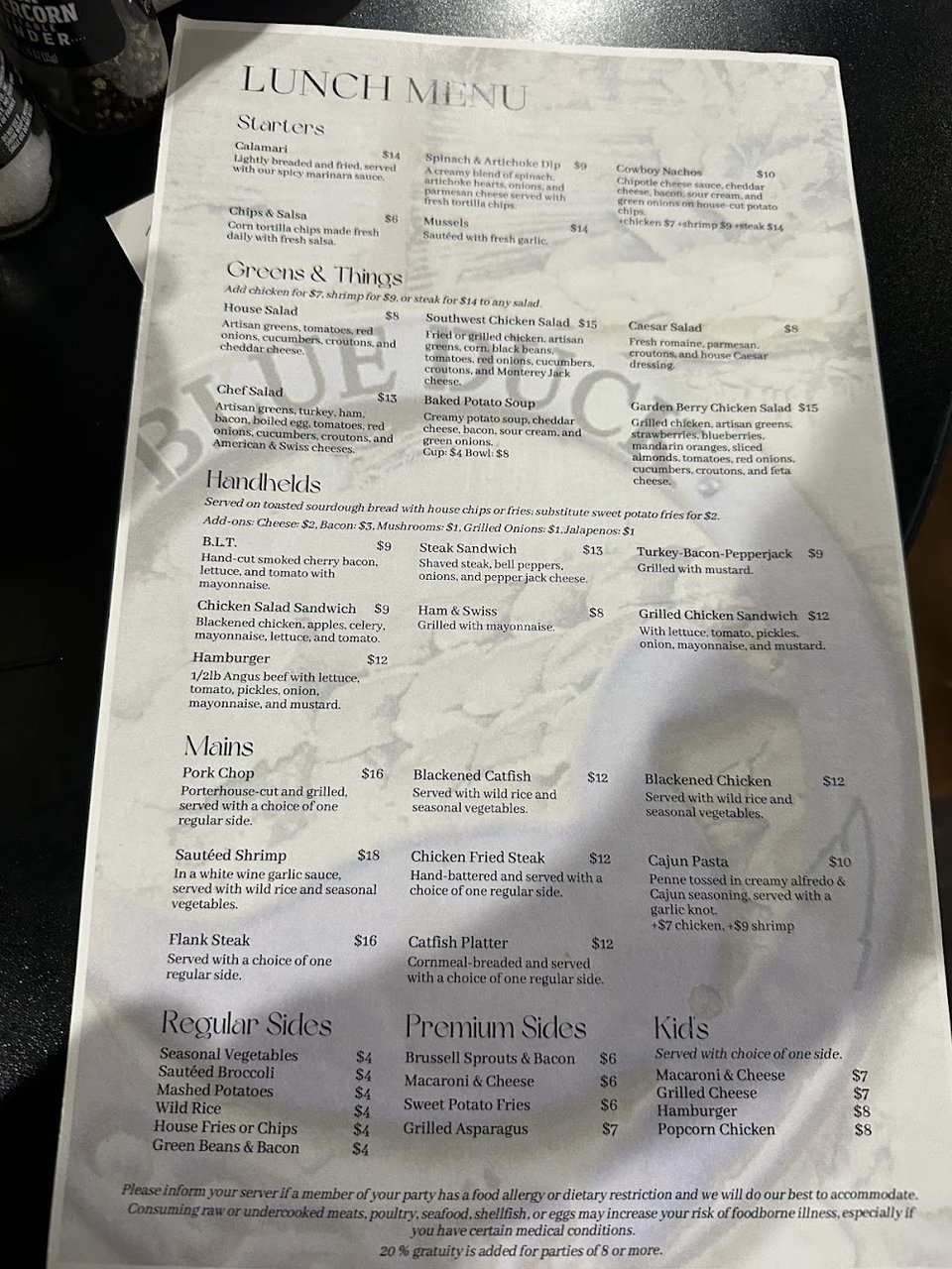 Food menu beside a full bar selection.
